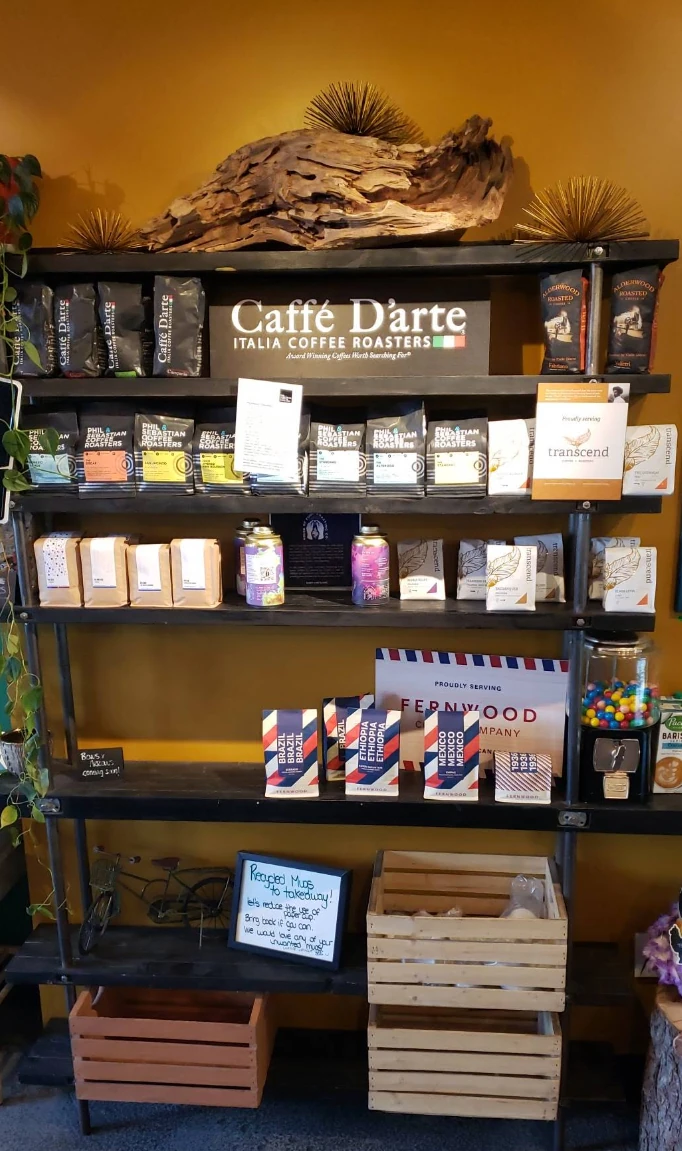 Coffee bags and cafe retail shelf at Bump N Grind Cafe